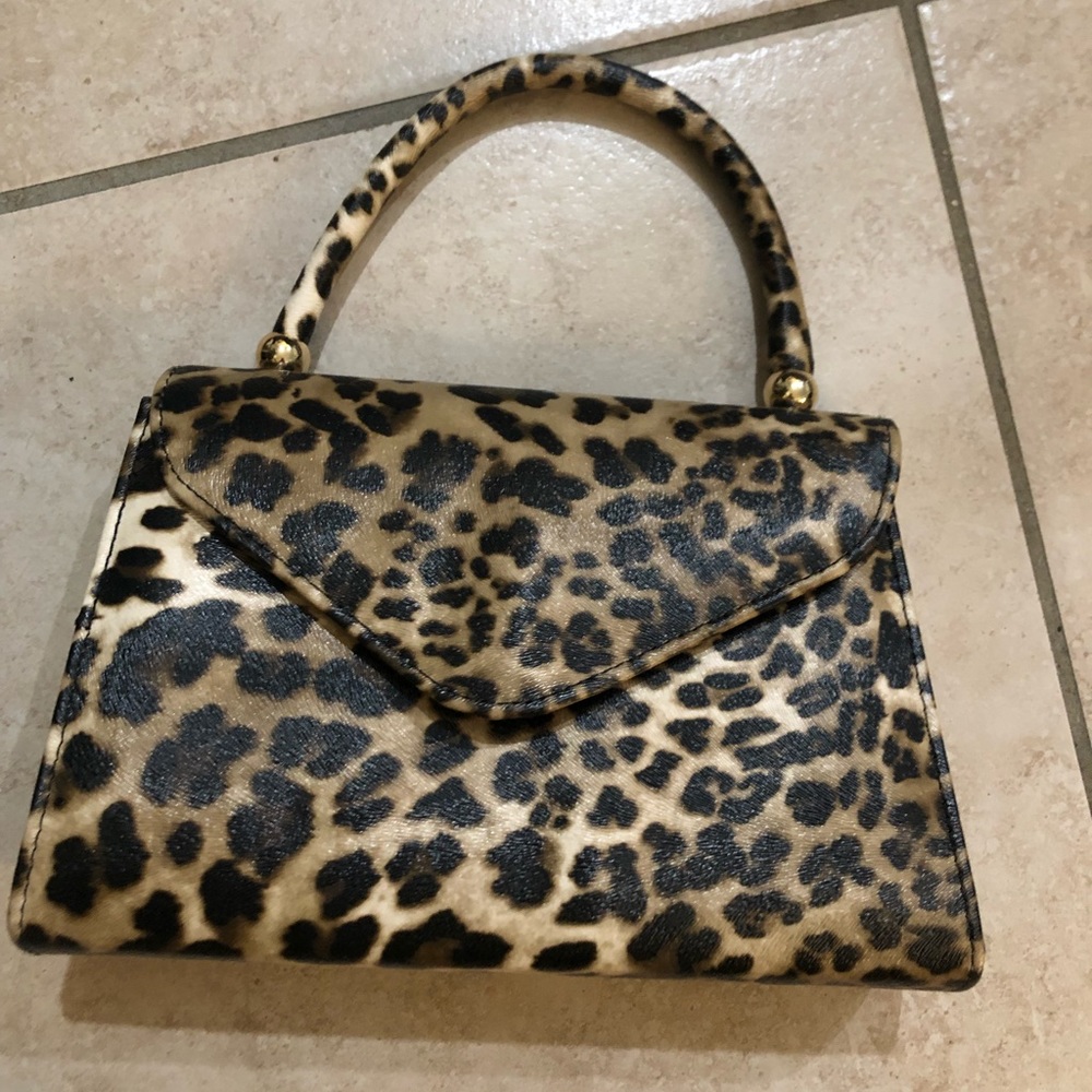 Leopard print handbag with gold accent